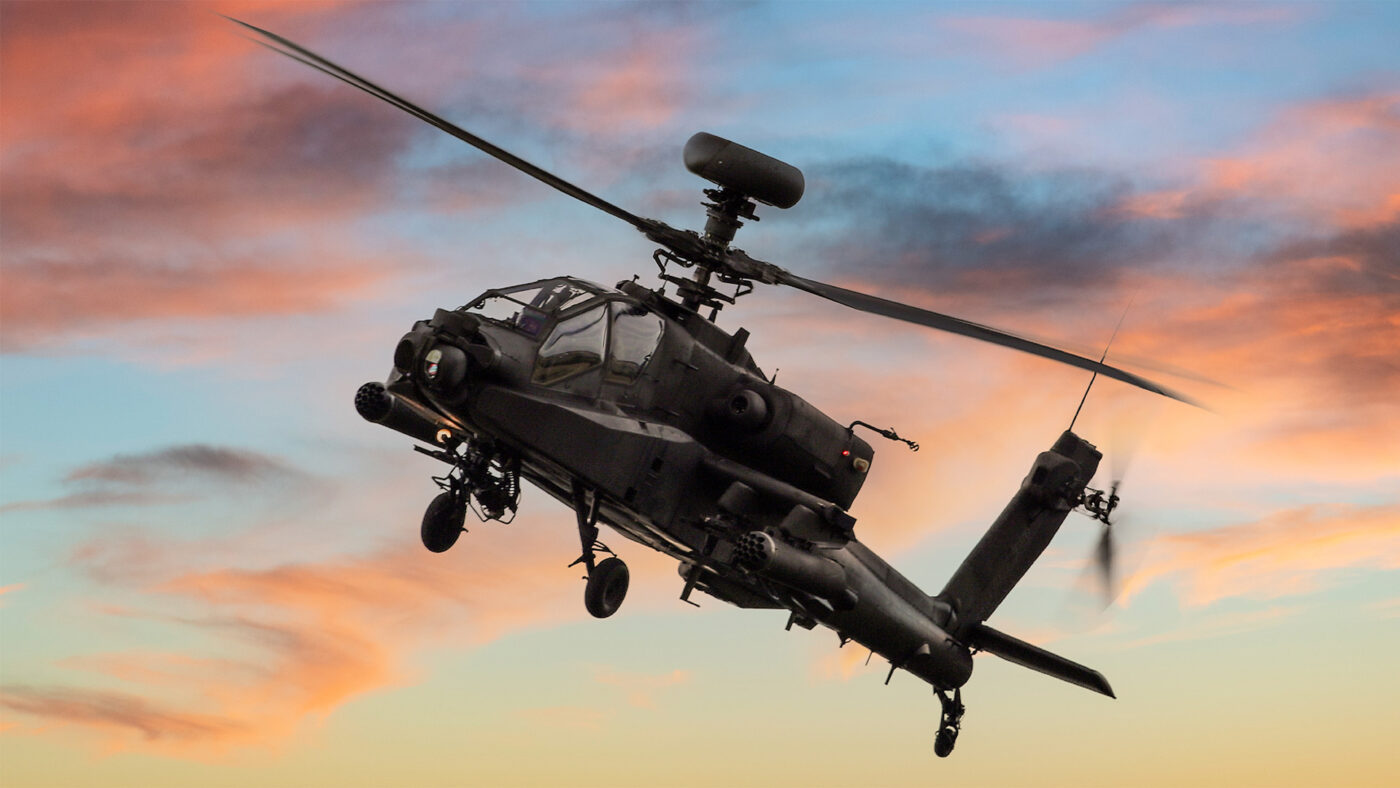 Apache helicopter at sunset